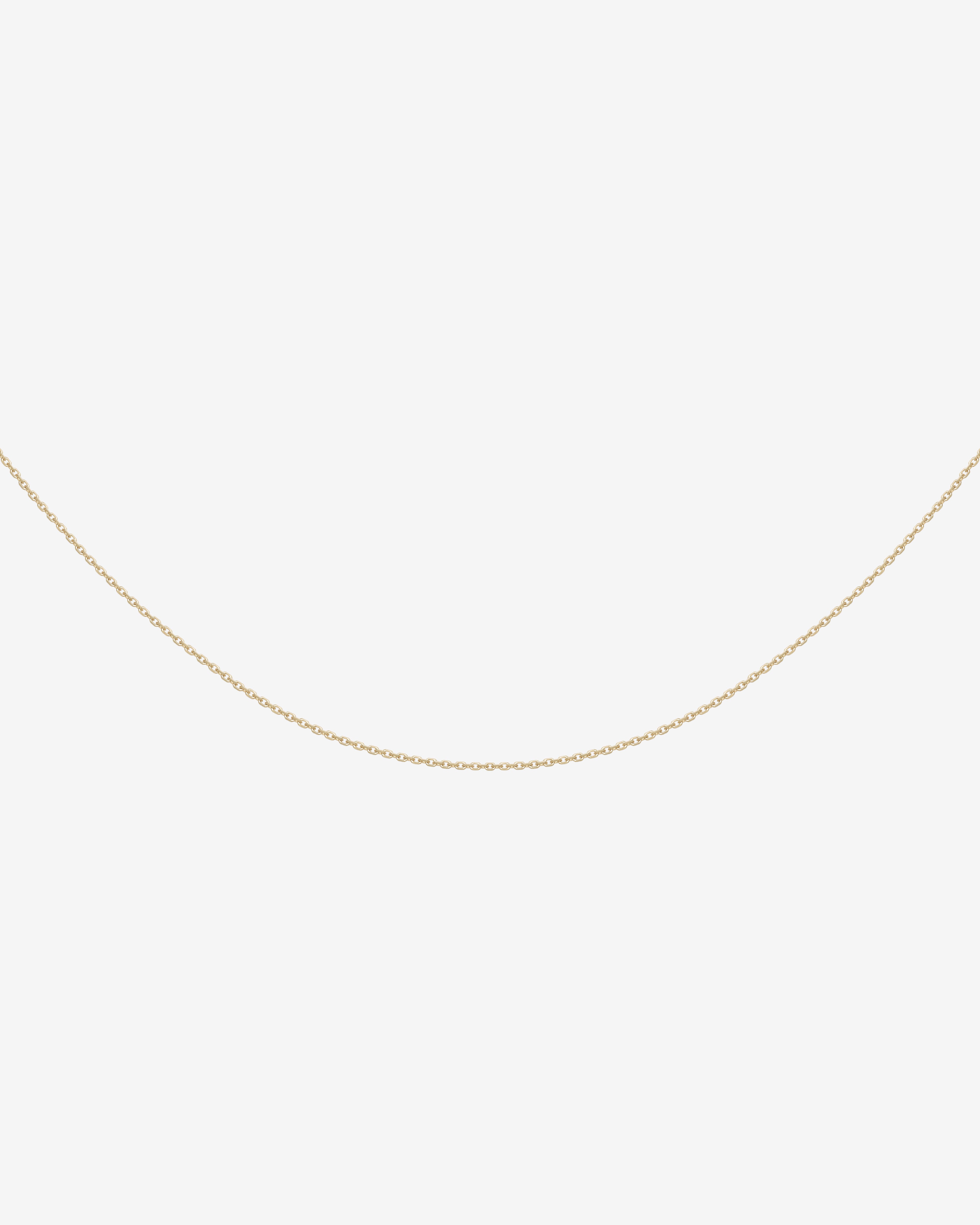 Gold necklace on a white background
