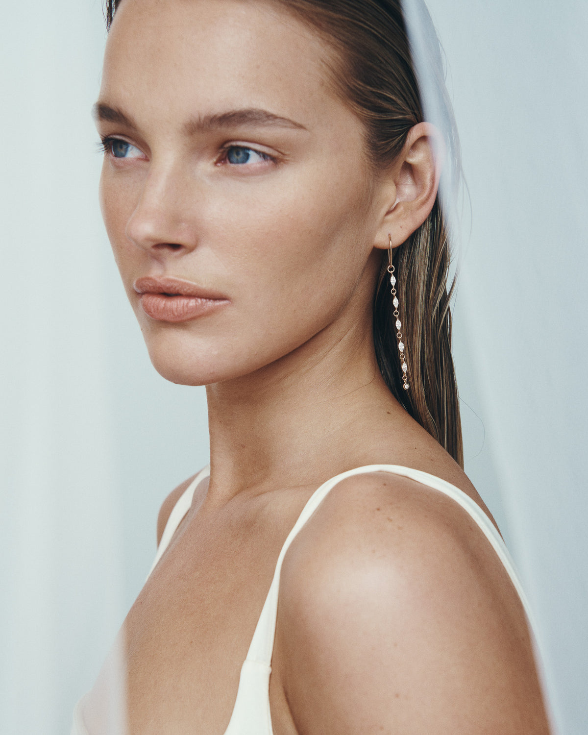 Aria Diamond Earrings Solid Gold, worn in profile