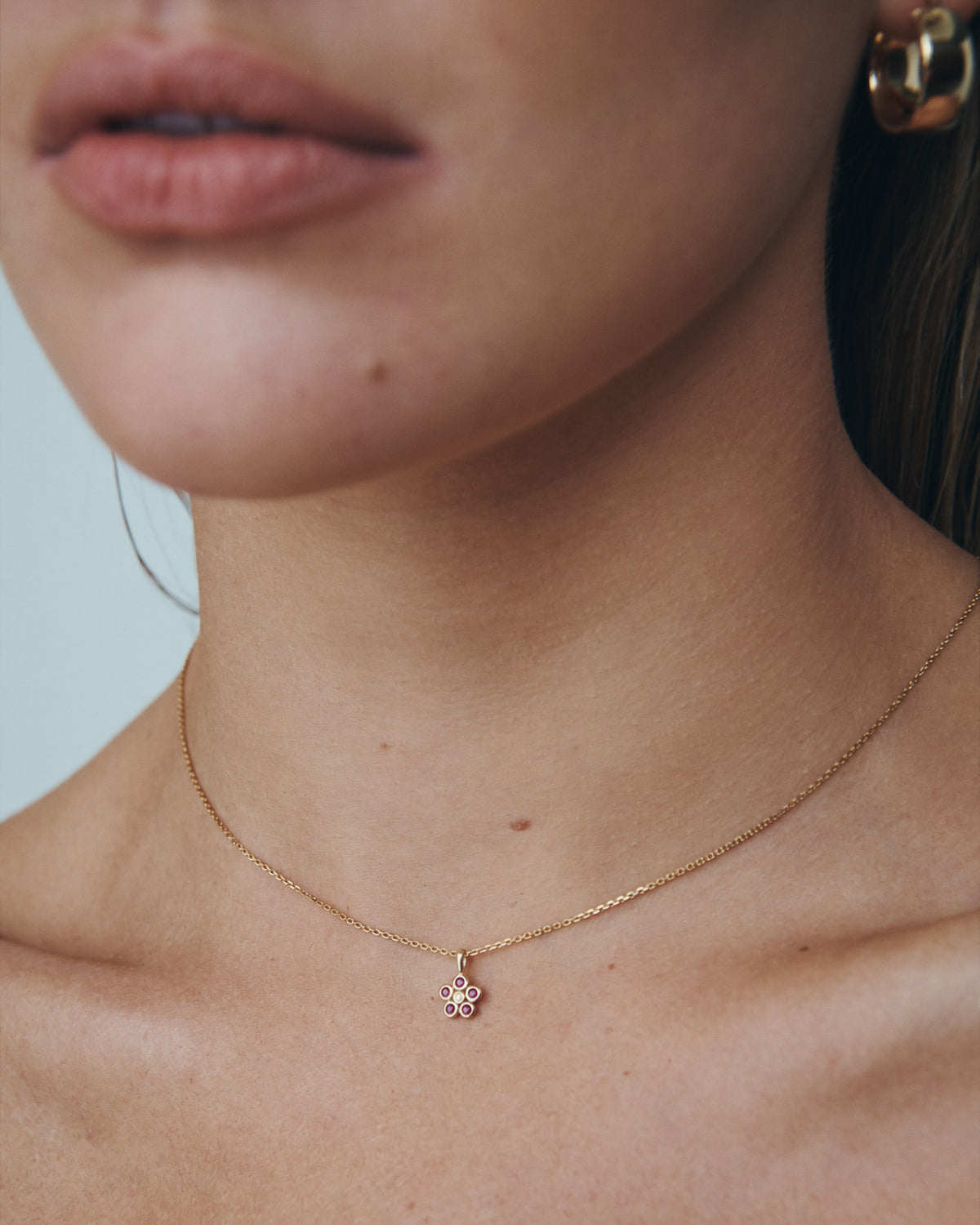 Daisy Ruby Necklace Solid Gold, worn