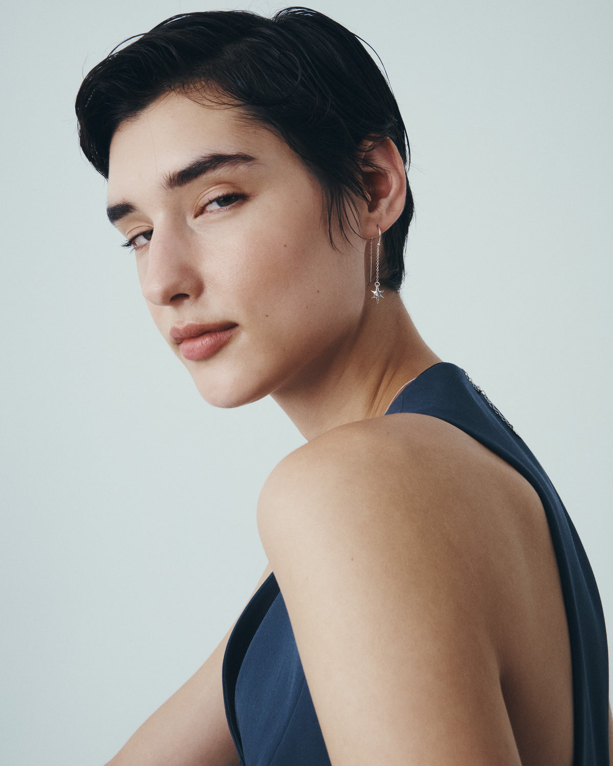 Electra Earrings and Electra Necklace in Silver, worn