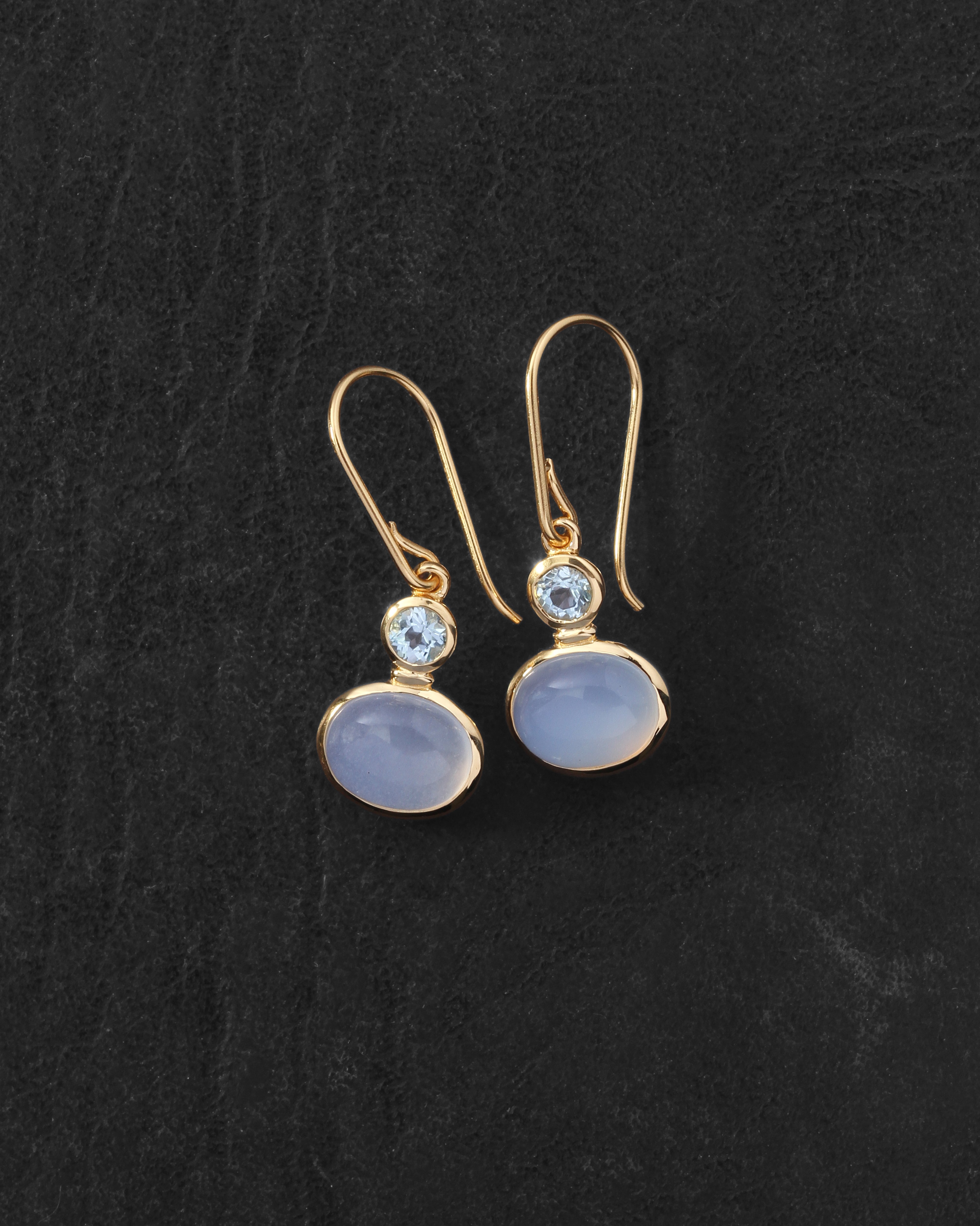 Ether Earrings Gold Vermeil on dark leather