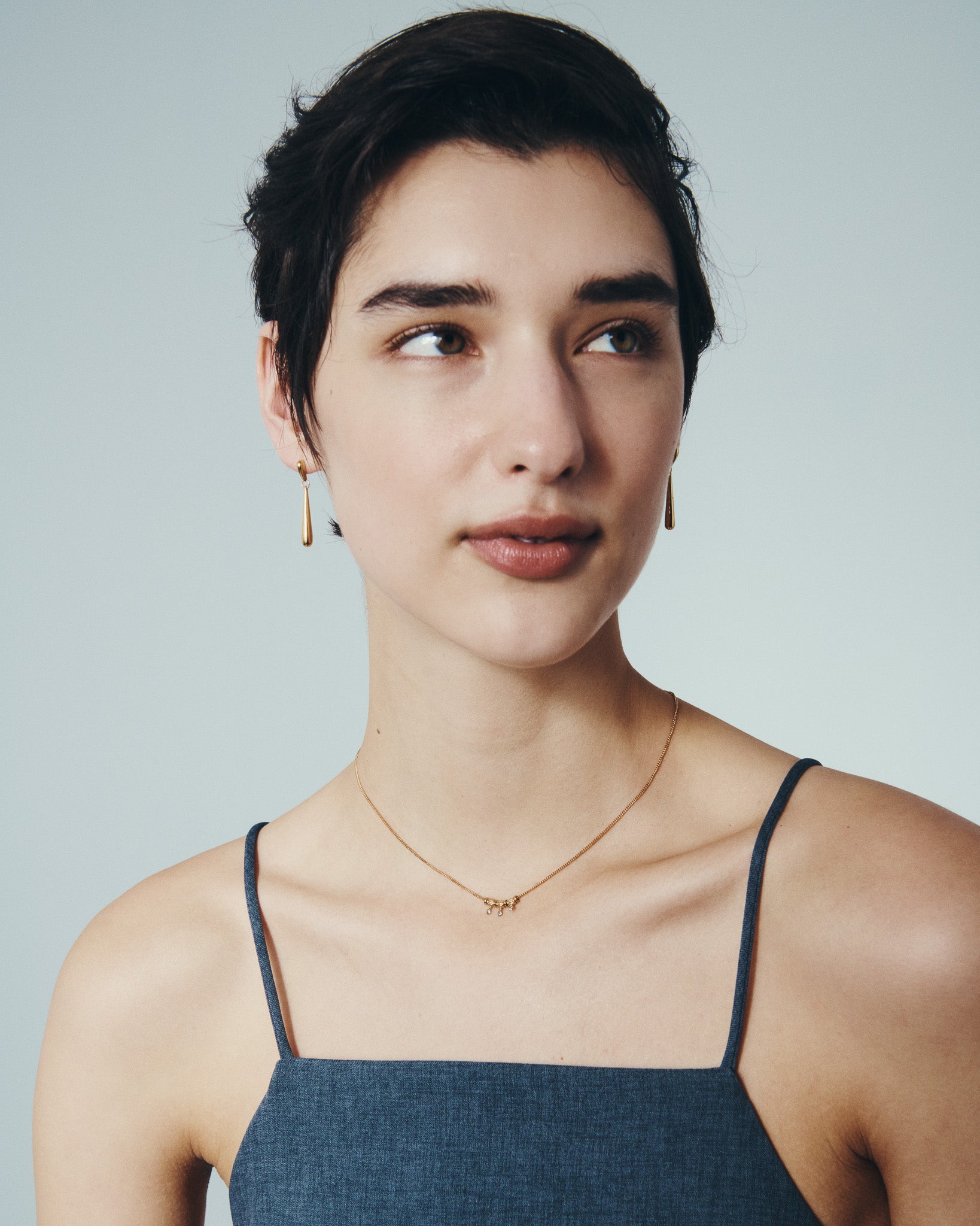 Isla Necklace and Stilla Earrings in Gold Vermeil, worn