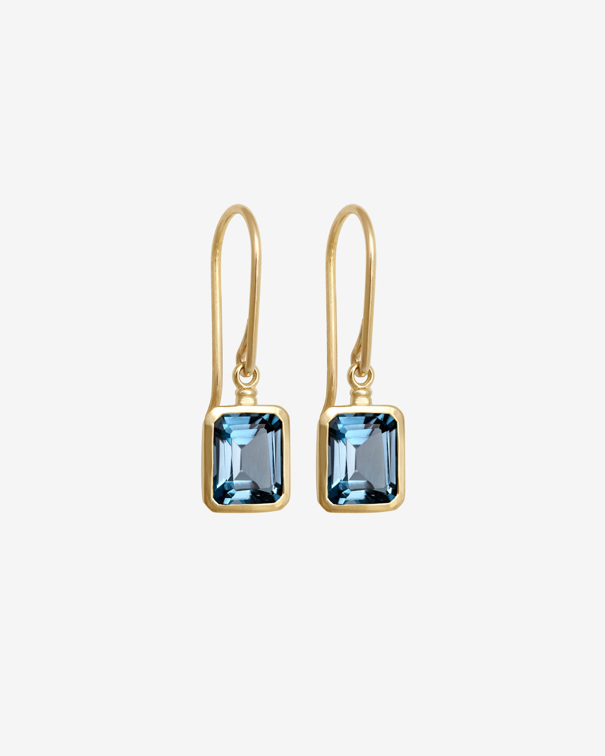 Mu Topaz Earrings Solid Gold set with an emerald-cut London blue topaz