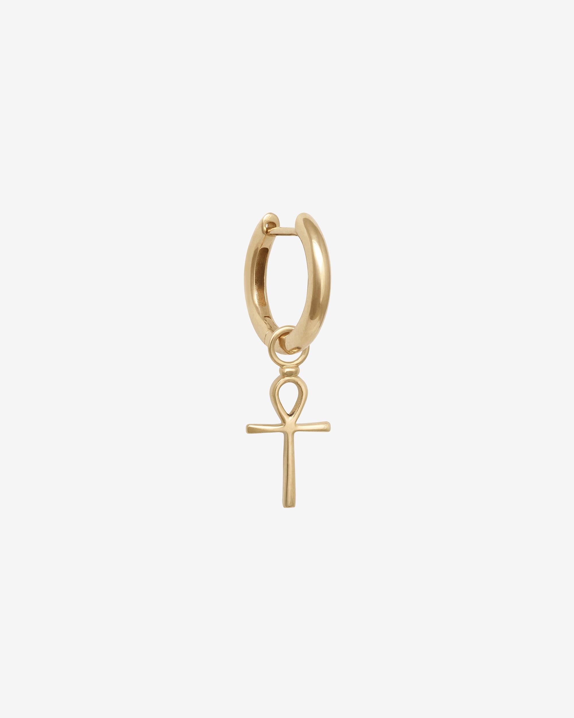 Gold hoop earring with an Ankh charm on a white background