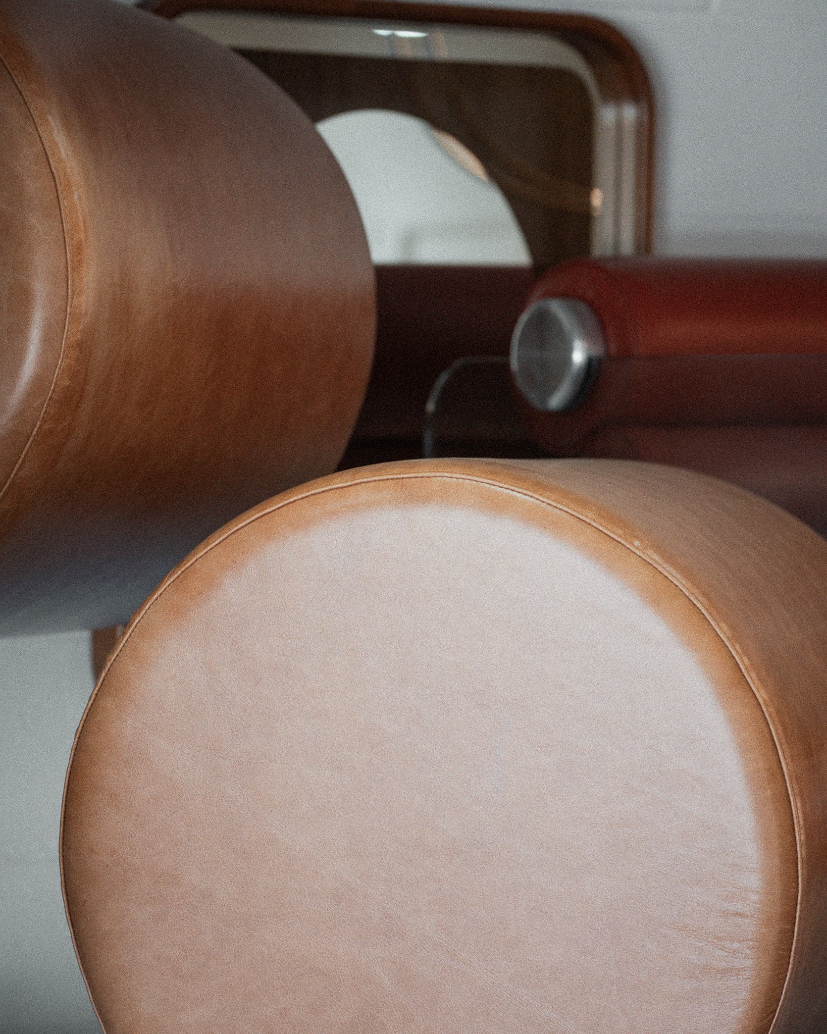 Close-up of wooden cylindrical objects with a blurred background