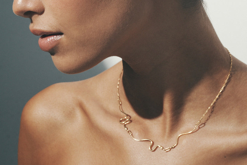 elsa peretti 18k gold snake necklace | dkfarnum