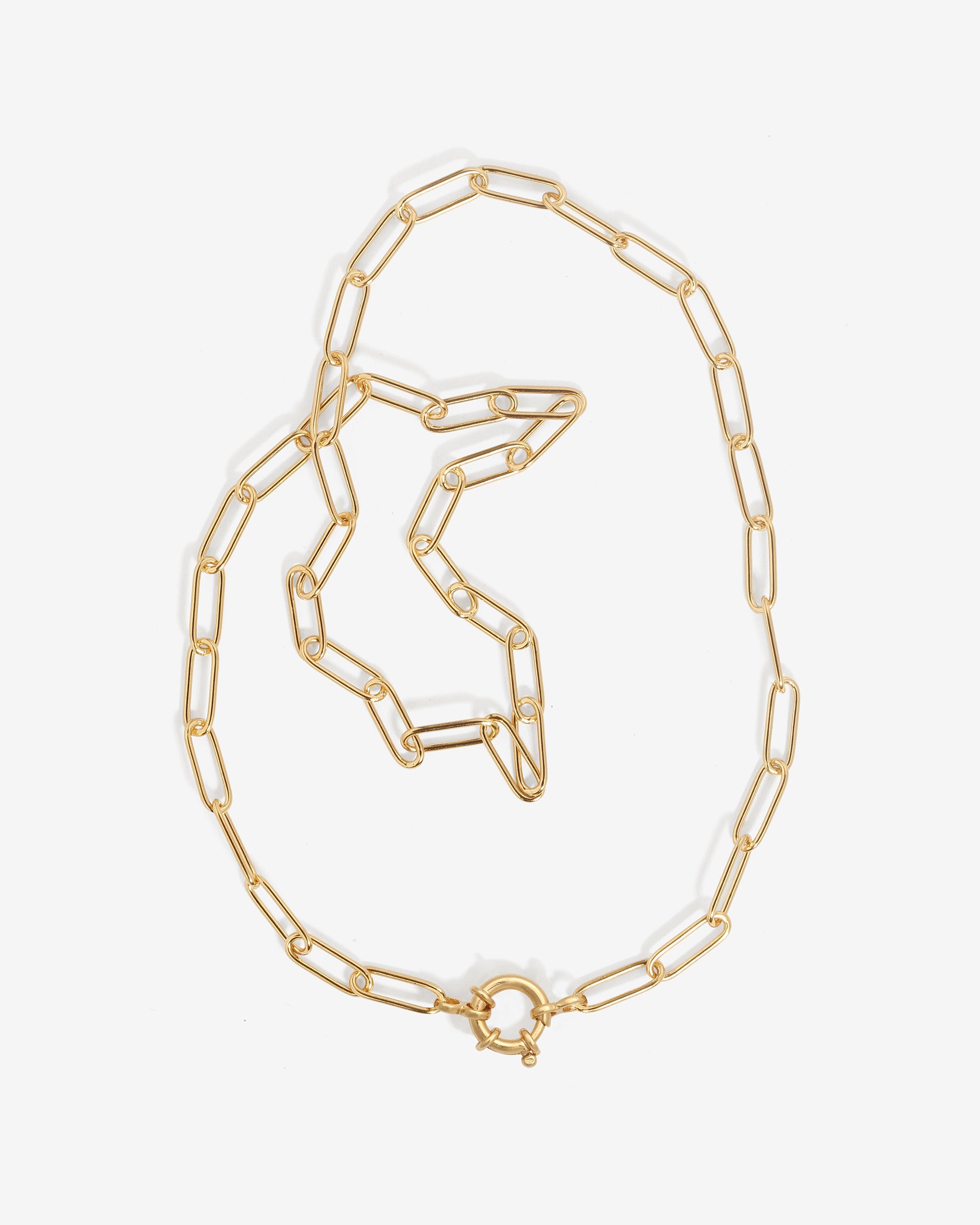 Gold chain necklace on a white background