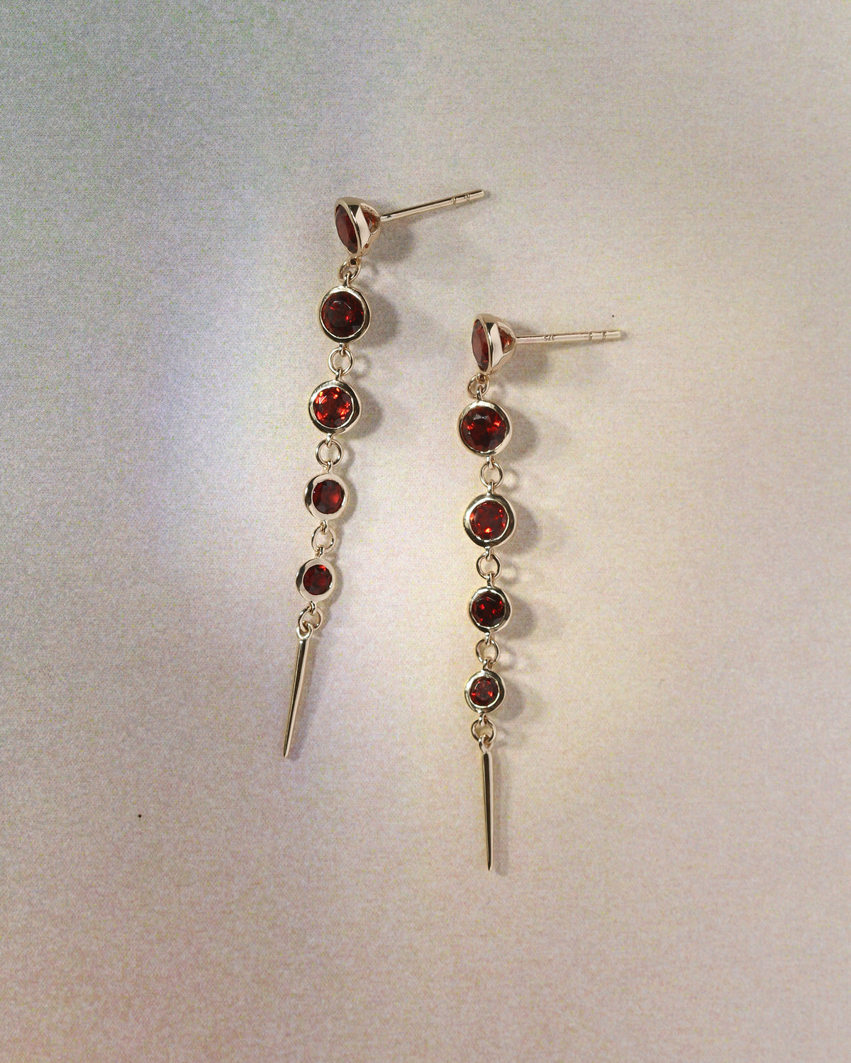 Aten Garnet Earrings Solid Gold, flatlay