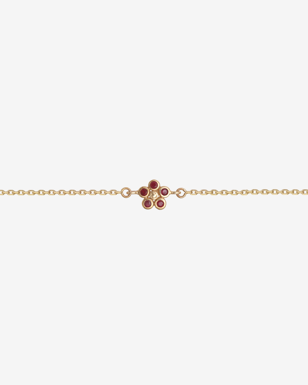 Daisy Ruby Bracelet Solid Gold, close detail of the ruby daisy