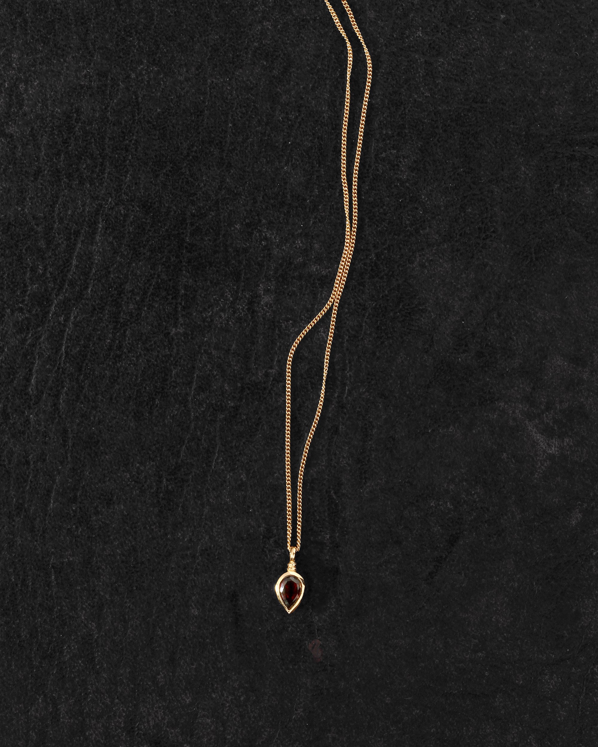 Ignis Necklace Gold Vermeil on dark leather
