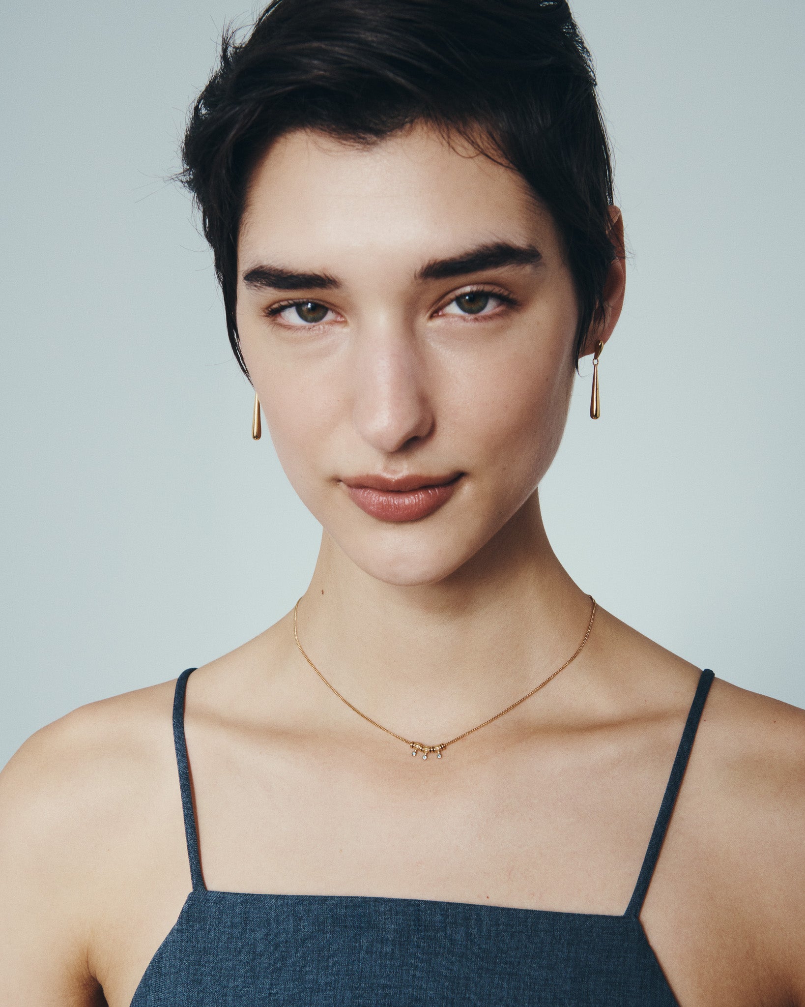Isla Necklace and Stilla Earrings in Gold Vermeil, worn