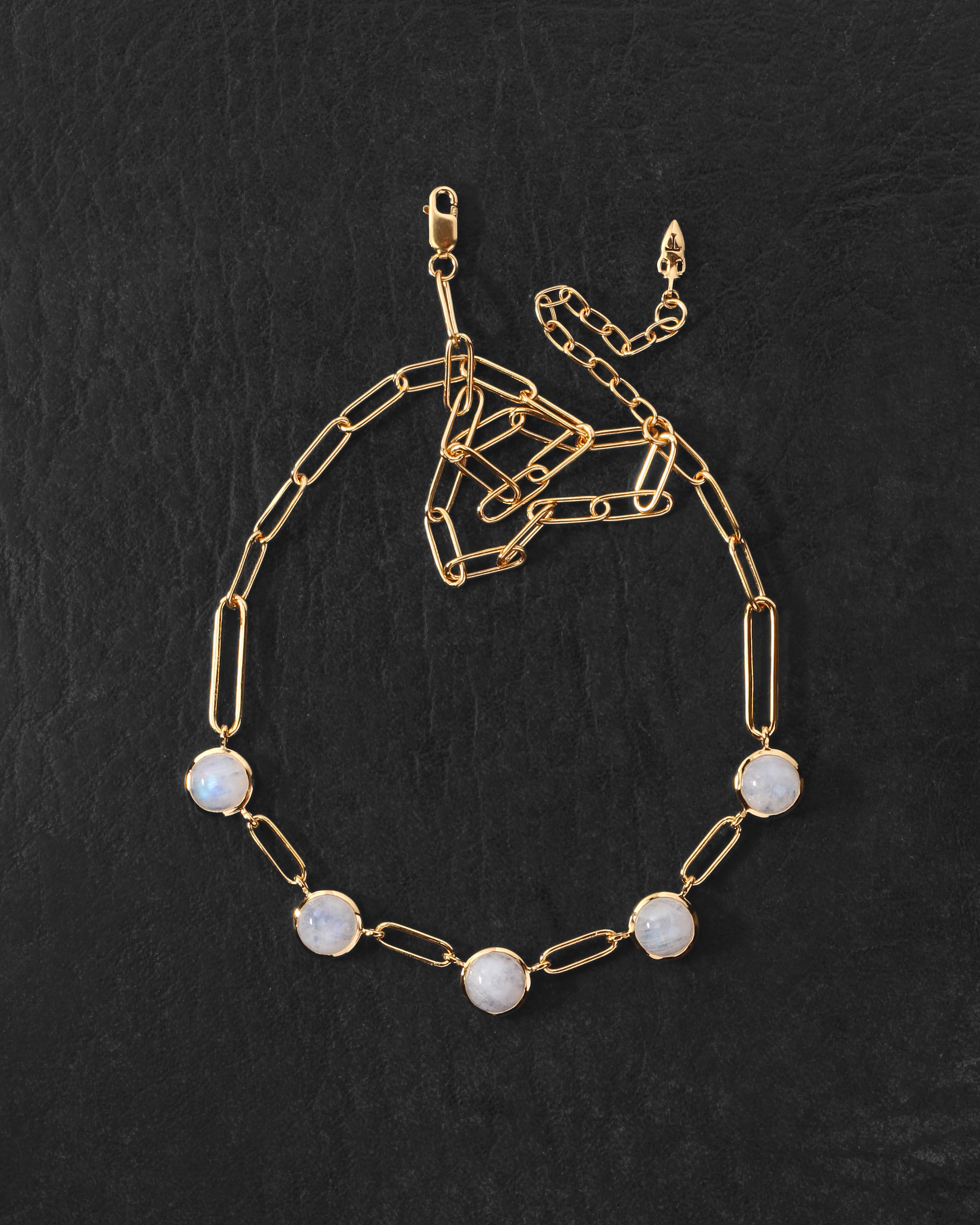 Lumi Necklace Gold Vermeil on dark leather