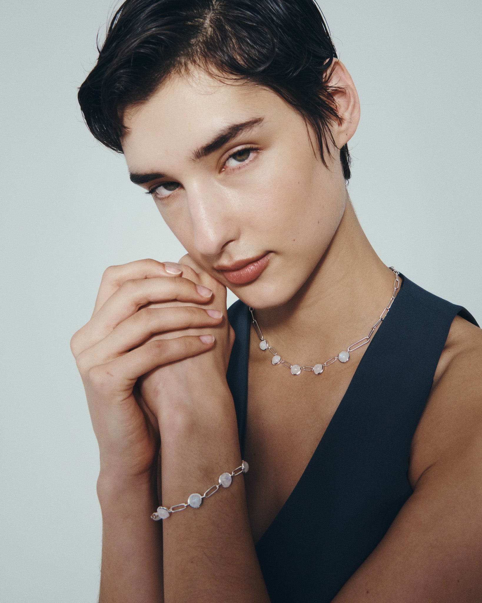 Lumi Necklace and Lumi Bracelet in Silver, worn