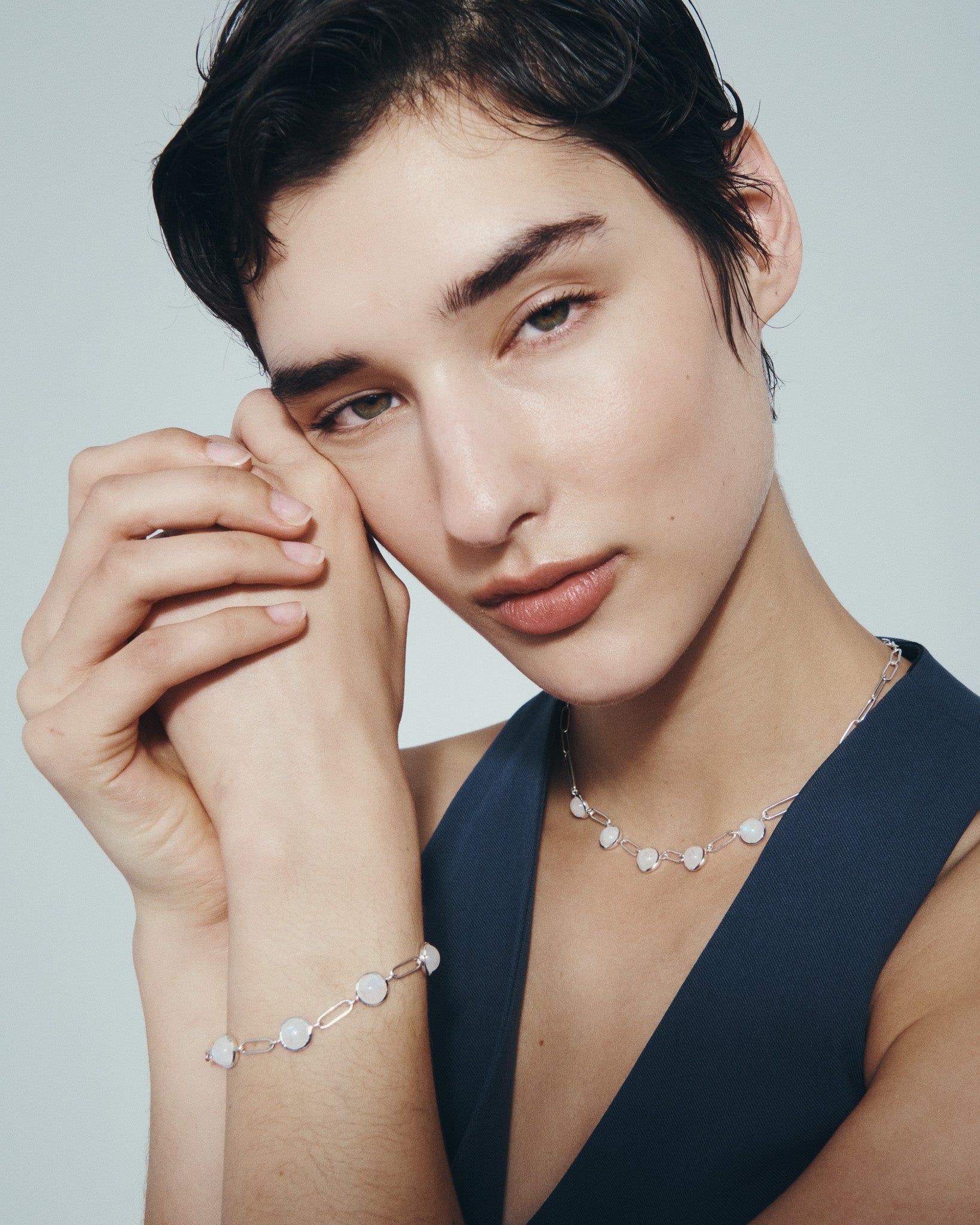 Lumi Necklace and Lumi Bracelet in Silver, worn