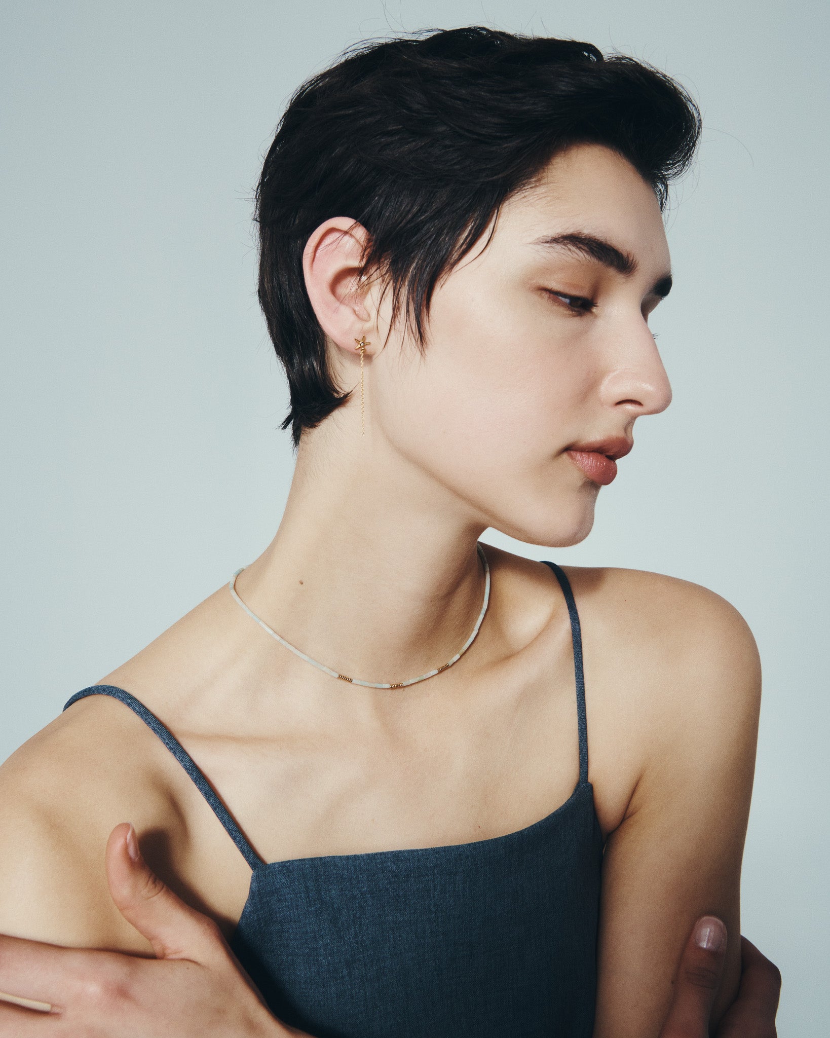 Mare Necklace and Seba Stud Earrings in Gold Vermeil, worn