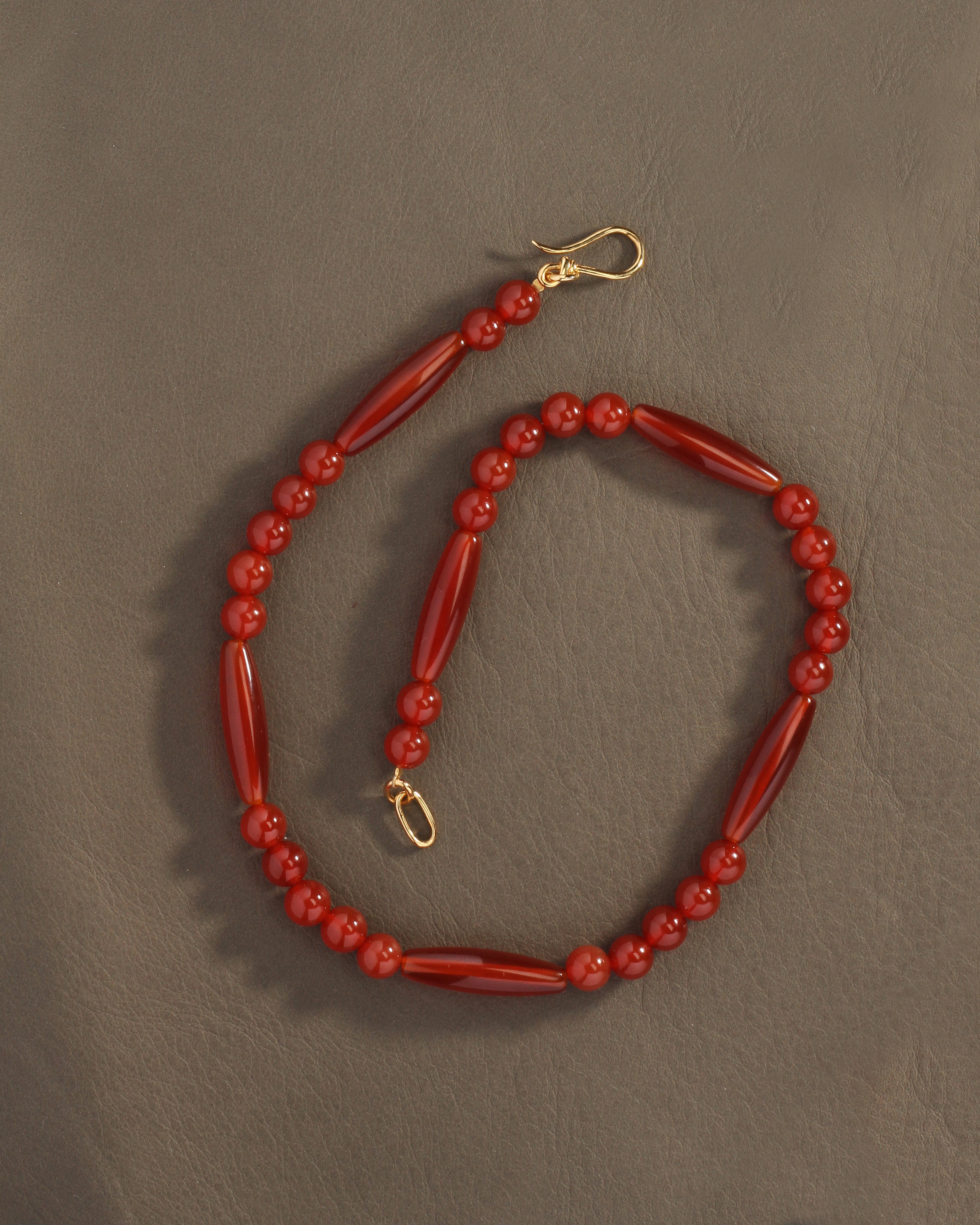 Solara Necklace Gold Vermeil on brown leather