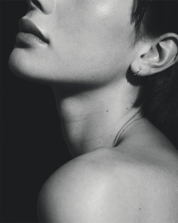 Temple of the Sun Omega Huggie Earrings Silver