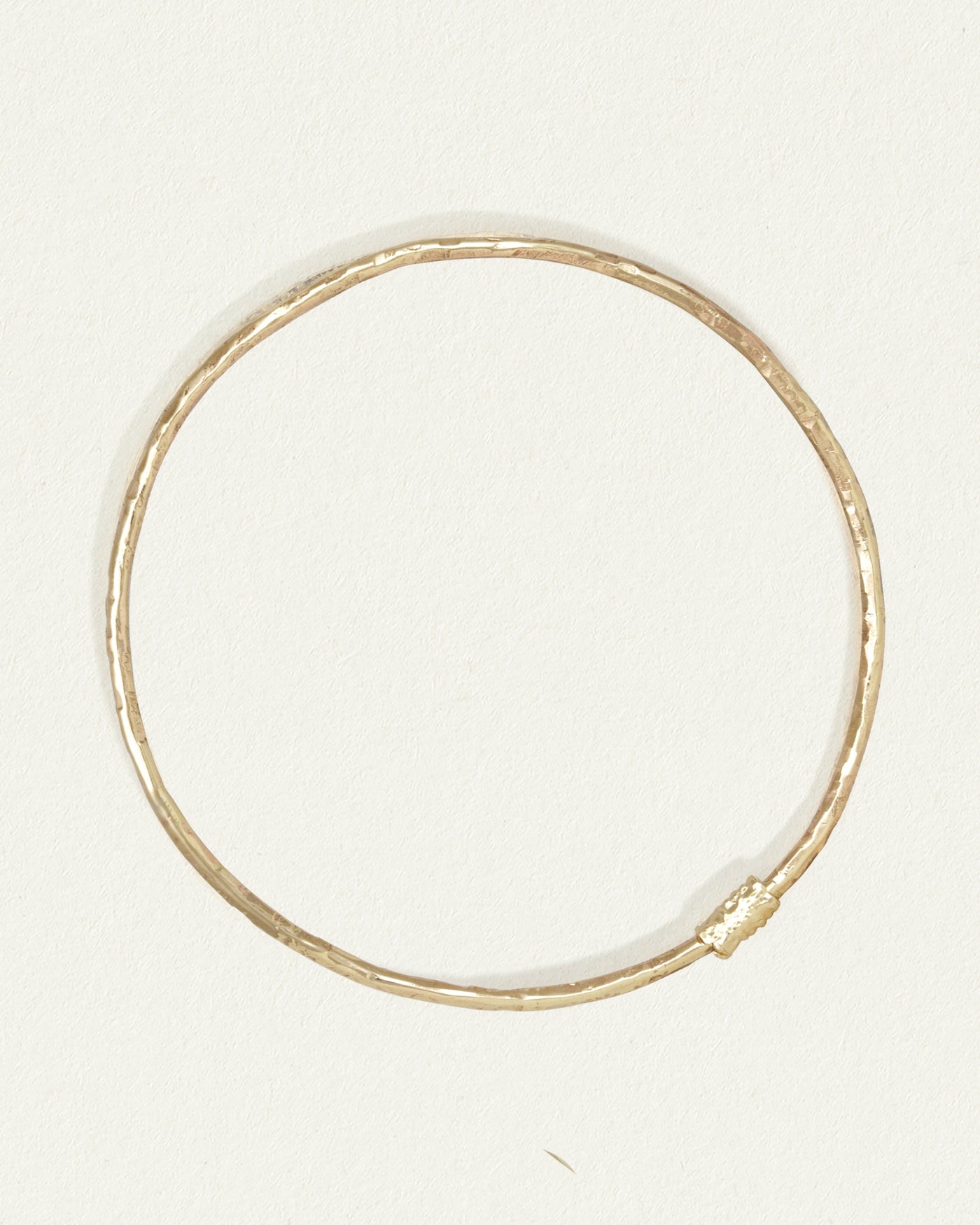 Thin solid clearance gold bangle